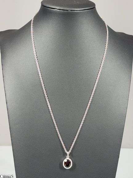 14KT White Gold Pendant with 19x8m Oval Garnet and 20 Approx. .005 RB Diamonds, Approx. .10/100 TCW on Chain Marked 14KT image