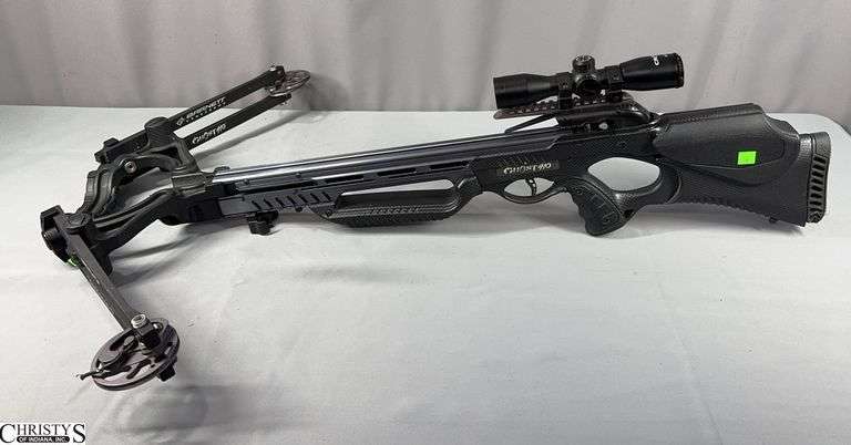 Barnett Crossbow Ghost 410 with Scope 3x32.  There may be pieces missing???  There are pieces laying separate. image