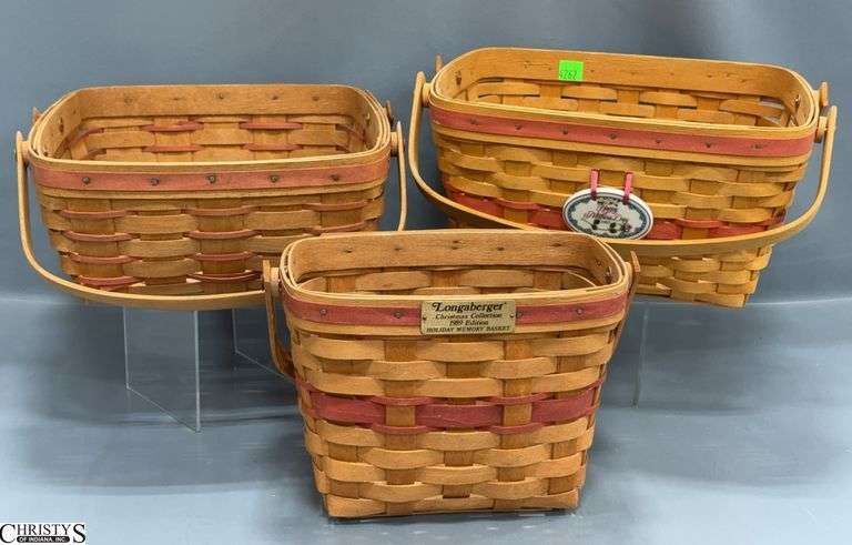 3 Longaberger Baskets.  1989 Holiday Memory Basket, 1997 Happy Mother's Day and a 9 1/2" Square X 4 1/2" Tall Basket with 2 Handles image