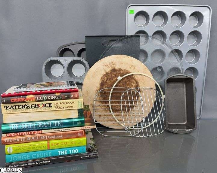 Assorted Muffin Pans, Bread Pans, Cutting Board, Cook/Health Books - 21" of largest image