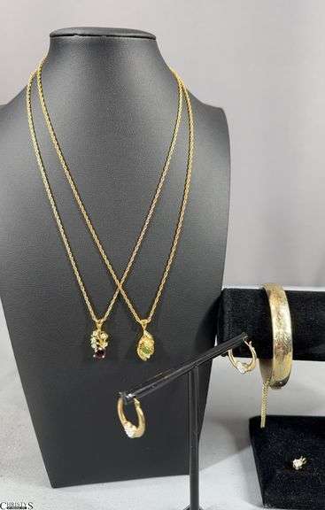 2 Necklaces with Colored Stone, 1 Yellow Gold Color Bracelet (unmarked), a Pair of Yellow Gold Color Earrings Marked 925 and a Yellow Gold Color Pendant with a Clear Stone (unmarked) image