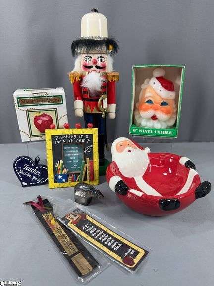 15" Tall Nut Cracker, 6" Santa Candle, Santa Bowl,  An Apple Marble Paper Weight, Teacher 4 1/2" X 5" Picture Frame and Other Teacher Smalls,  a DANSK Designs Japan Polar Bear Figurine / Paperweight (Silver-Plate) and a Collapsible Emergency Snow Shovel in Box. image