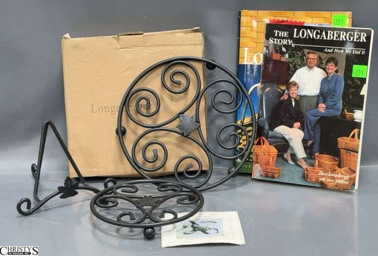 Set of 2 Wrought Iron Trivets in Box, Small Table Top Easel and 2 Books.  The Longaberger Story and An American Success Story Longaberger image