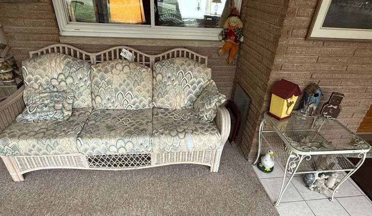 (2) Wicker Patio Couches, Glass Top Table with Contents image