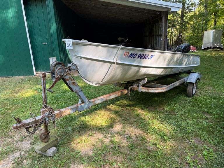 Lund C-14 Boat with Johnson 9.9HP Outboard Motor image