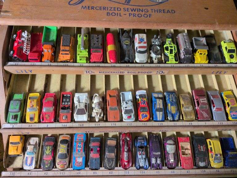 3 rows of toy cars image
