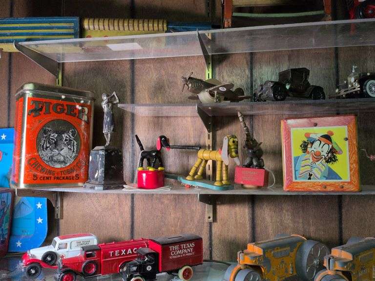 Tiger chewing tobacco tin, metal golf statue, 3 spring loaded animals and Mattel Jack in the box image