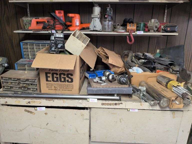 Parts containers, automotive belts, fishing reels(3 Zebco &1 Shakespeare), welding rods, and misc. image