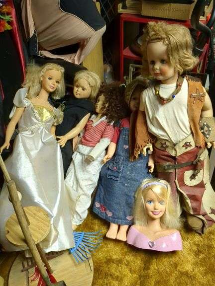 5 large dolls and Barbie head image
