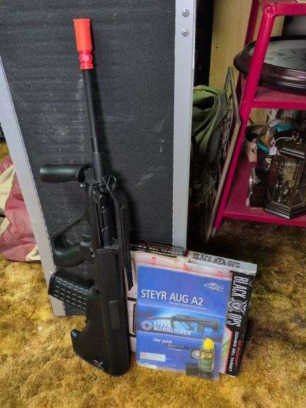 Aftermath Steyr Aug A2 airsoft gun and targets image