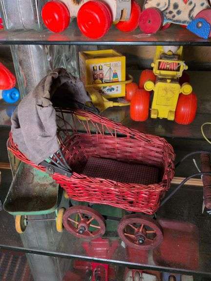 2 Wyandotte doll carriages and wicker doll buggy image