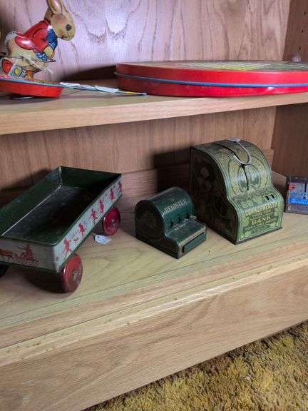 Ohio Art wagon, J Chein dime register, American commonwealth bank register and toy register image