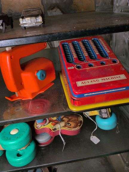 Wolverine adding machine and Empire toy saw image