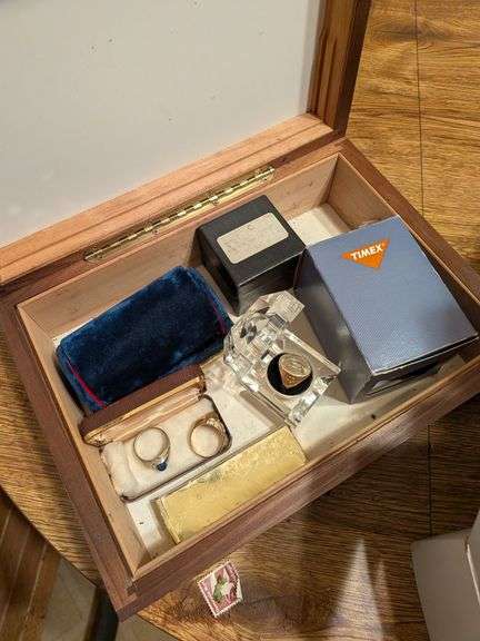 Jewelry in wooden box: rings, bracelet, pocket knife, necklace and watch image