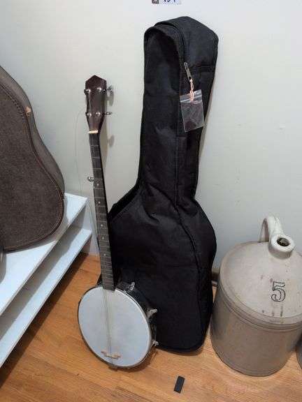 Fender acoustic guitar with soft case and banjo image