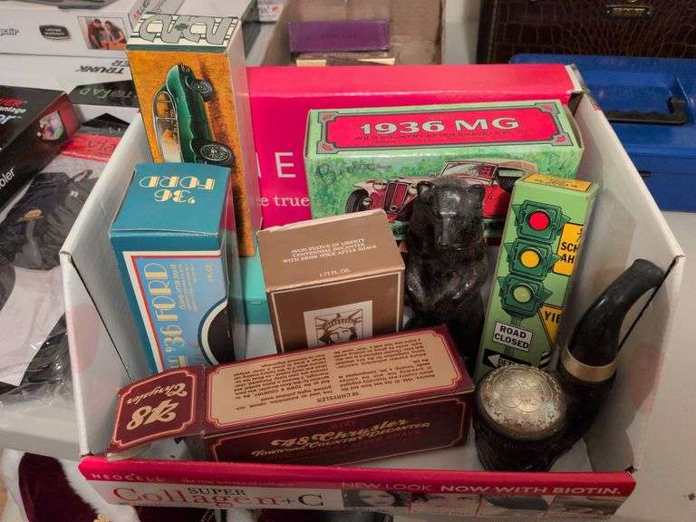 Avon collectible aftershave: Jaguar car, 1936 MG, stoplight, bear, Statue of Liberty, 48 Chrysler and misc image
