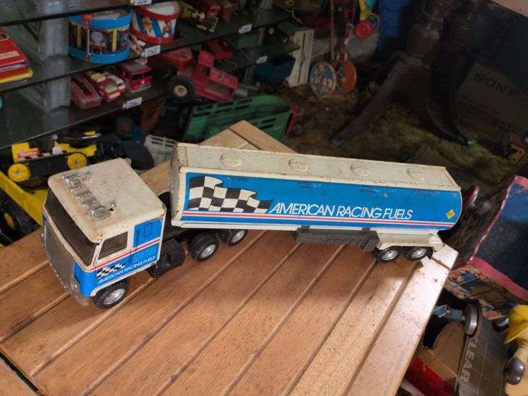 Tonka Fire truck, Ertl tractor trailer and Marx truck with box bed image