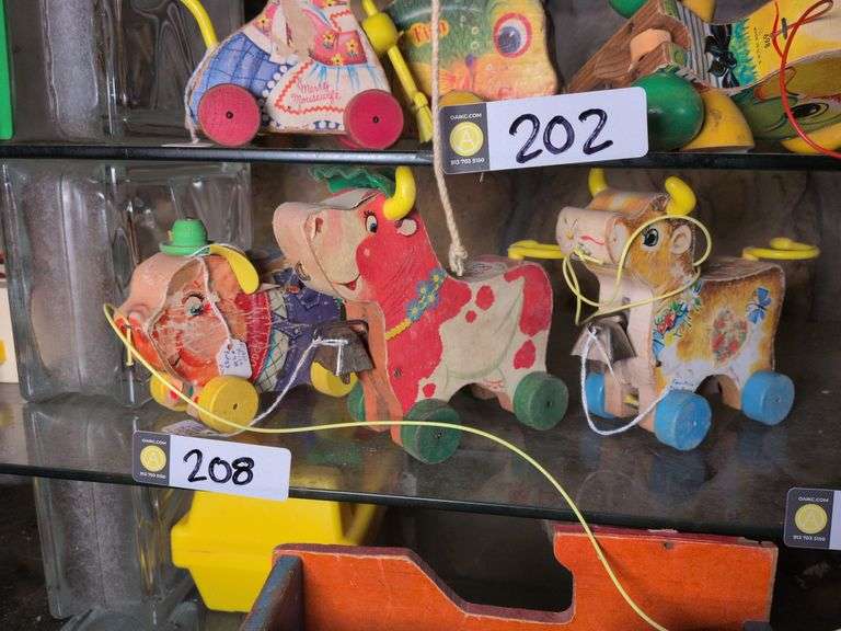 Fisher Price Pudgy Pig #478, Fisher Price Bossy Bell #654 and Fisher Price Bossy bell #65 image