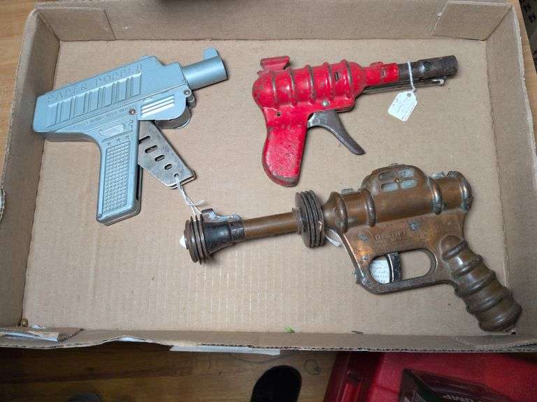 Buck Rogers Disintegrator, Wyandotte All Metal Products Space gun and Meldon Paper Popper pistol image