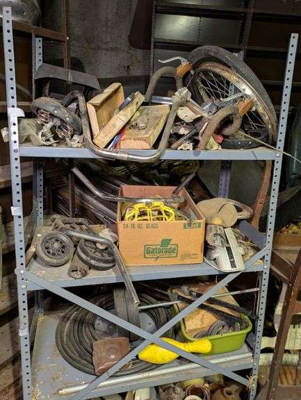 Three Shelves of Bicycle Parts image