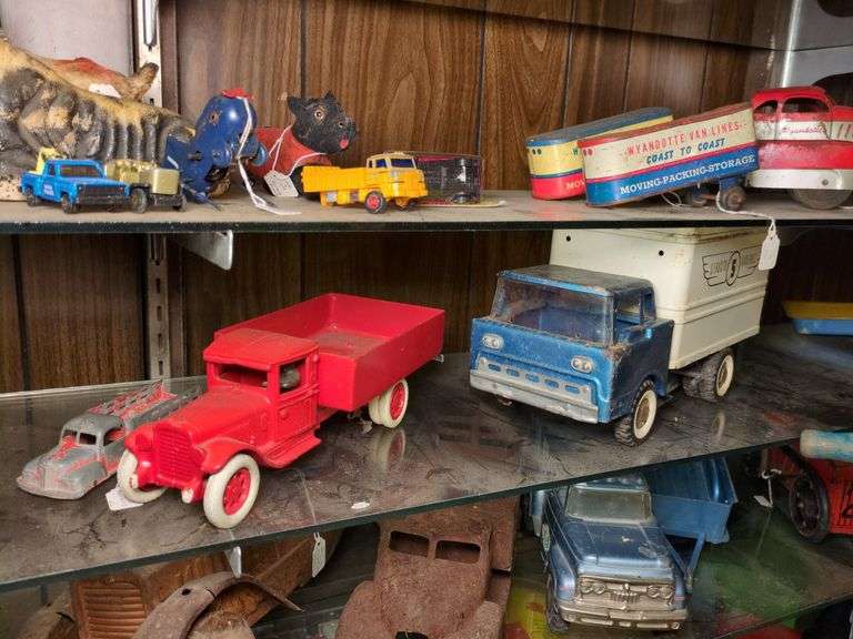 Structo Airlines Lift truck, Tootsie Toy Mack B and red toy truck image