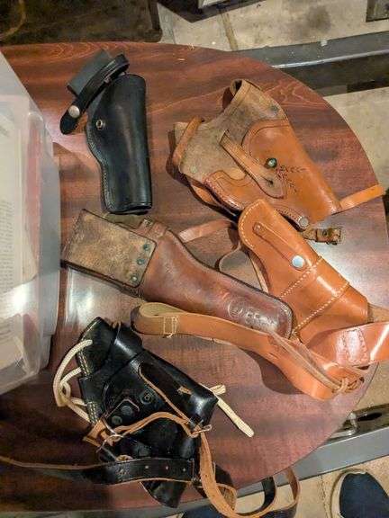 4 Leather holsters and vintage Charter Arms box