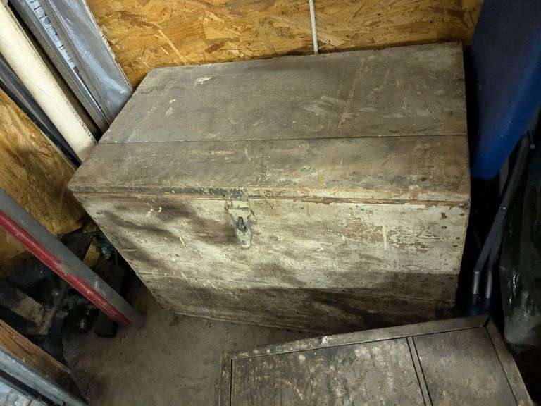 Vintage wooden chest with vintage tools