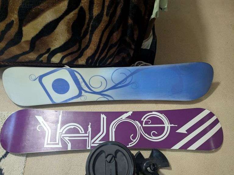 Snowboards, cooler and anchor