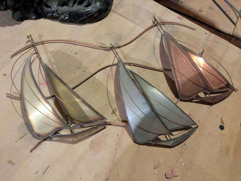 Metal sail boats and ceramic cat