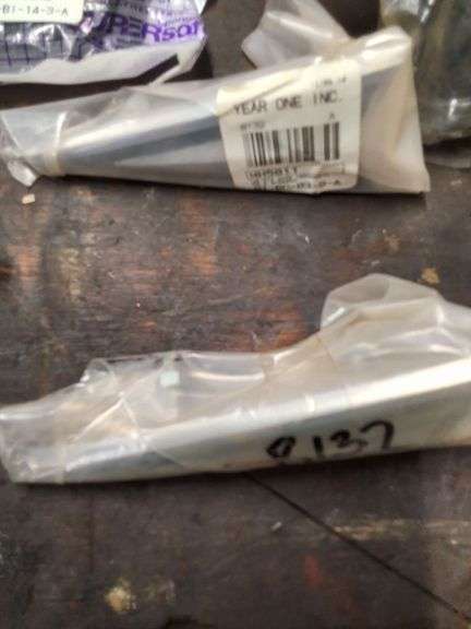OEM and after market GTO emblems, parts, lights, brake pad, brake pad lining cover and misc.