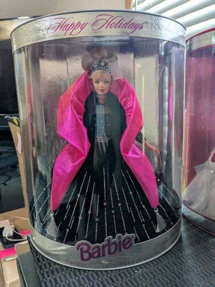 4 Barbie dolls