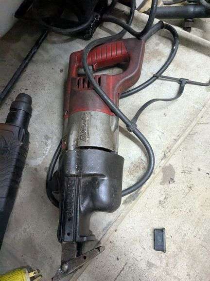 DeWalt dw140 drill, Bosch hammer drill, and Milwaukee sawsall