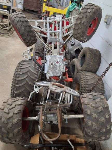 Two 4 wheelers and parts from project image