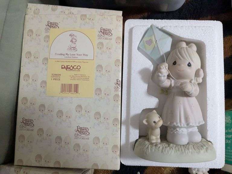 7 Precious moments figurines