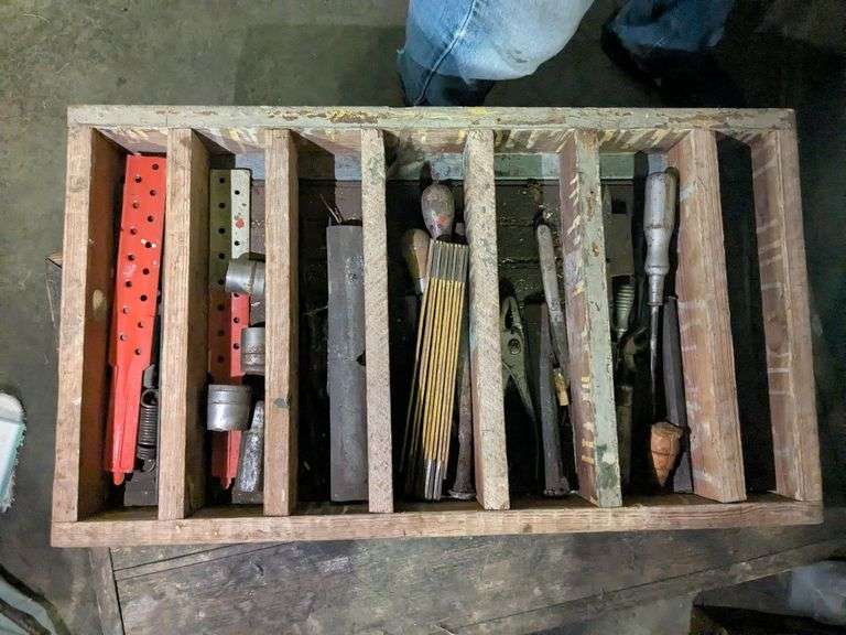 Vintage wooden chest with vintage tools