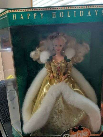 4 Barbie dolls