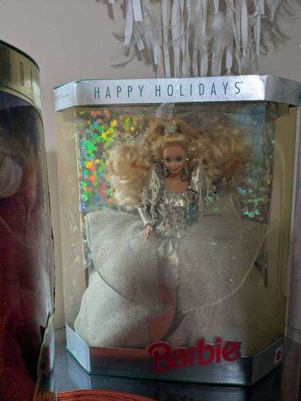 4 Barbie dolls