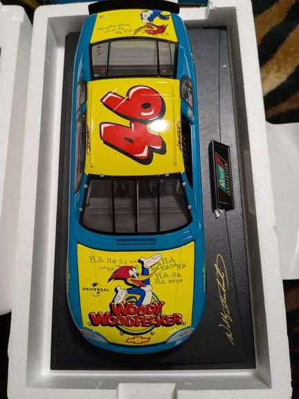 4 Revell 1:18 scale diecast replica cars: Dale Jarrett 88, Kenny Irwin 28, Tony Stewart 24 and 1997 Woody Woodpecker Chevy