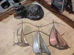Metal sail boats and ceramic cat
