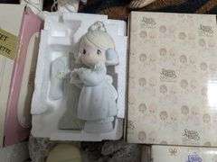 6 Precious moments figurines