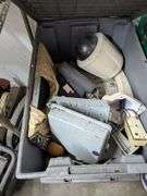 Three gray tubs with security system