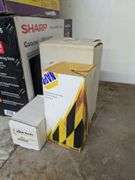 Top of filing cabinets: Hamilton Beach coffee pot, Sharp microwave and misc.