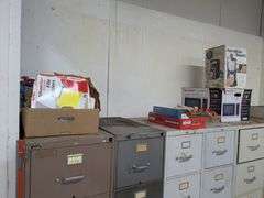 Top of filing cabinets: Hamilton Beach coffee pot, Sharp microwave and misc.