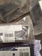 OEM and after market GTO emblems, parts, lights, brake pad, brake pad lining cover and misc.