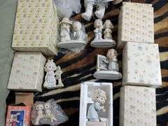 6 Precious moments figurines