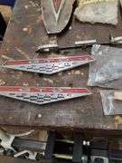 OEM and after market GTO emblems, parts, lights, brake pad, brake pad lining cover and misc.