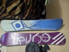 Snowboards, cooler and anchor
