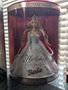 4 Barbie dolls