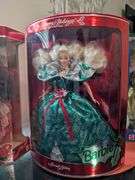 4 Barbie dolls