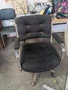2 Rolling office chairs and one stationary chair